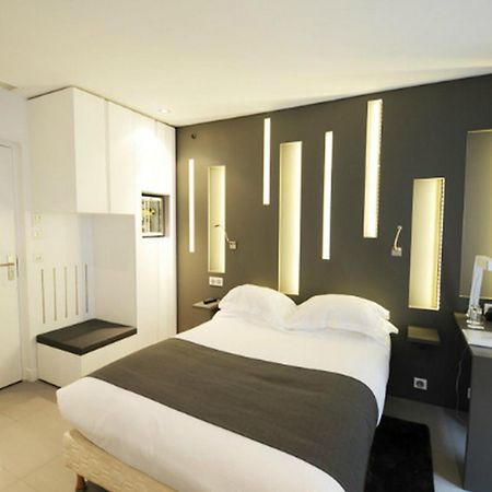 Hotel Arc De Triomphe Etoile Paříž Pokoj fotografie